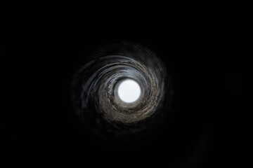 Close-Up View Inside a Gun Barrel Revealing the Rifling Spiral Pattern