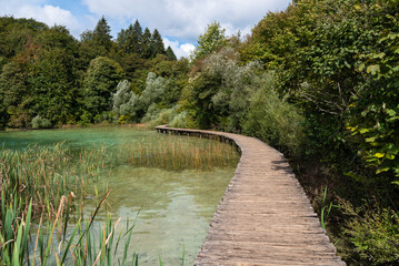 Fototapeta na wymiar The wooden walk way in Plitvice National Park in Croatia