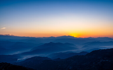 gloomy sunrise over mountains in Nepal.