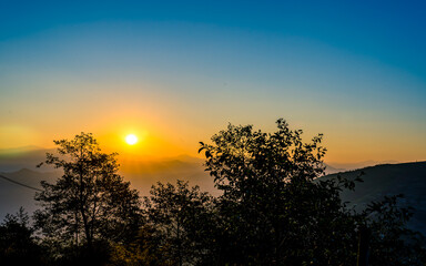 Fototapeta na wymiar gloomy sunrise over mountains in Nepal.