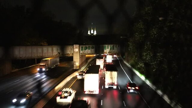 Washington DC USA Traffic on the Interstate 495 Beltway at night and the Washington D.C. Temple, or Mormon Temple. 