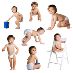 Adorable child, little baby bot in diaper in motion, paying isolated on white background. Curious playful kid. Concept of childhood, health care, baby emotions, growth