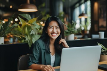 South east asian businesswoman computer sitting laptop