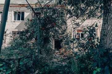 destroyed houses in an abandoned city without people in Ukraine
