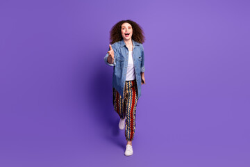 Full size photo of cool nice girl raise arm reach run you wear denim shirt isolated on violet color background
