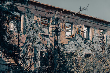 destroyed houses in an abandoned city without people in Ukraine