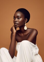 A black woman wearing white minimal dress and white minimal earring photography portrait jewelry. - obrazy, fototapety, plakaty