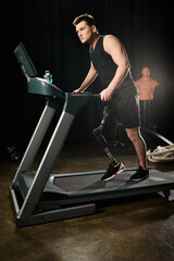 A disabled man with a prosthetic leg runs on a treadmill in a dimly lit gym, pushing himself to...