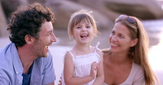 Happy family, kid and parents tickle at beach on vacation, summer holiday and travel outdoor. Funny mother, father and girl at ocean having fun, child laugh and bonding together at sea while playing