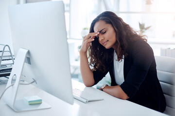 Frustrated, business woman and computer with headache in stress, debt or mistake and burnout at office. Female person or employee with migraine, anxiety or depression in financial crisis at workplace