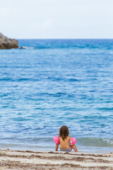 Kid enjoying the view of the sea in Tropea Calabria Italy