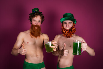 Green beer and two attractive guys.