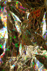 Holographic Crumpled Gold Bronze Paper Material which is Shiny for Background