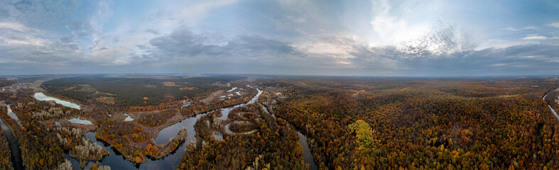 Obraz premium Autumn aerial panorama of Siverskyi Donets River valley with blue epic cloudscape in Ukraine