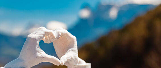 Heart hands gesture with a 3D printed sculpture - free model from thingiverse - with Mount Schlern...