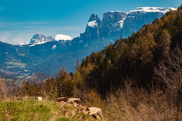Alpine spring view with Mount Schlern, dolomites, in the background near Klobenstein, Ritten, Eisacktal valley, South Tyrol, Italy