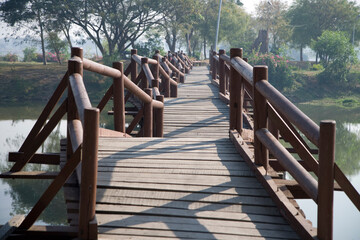 Myanmar wooden bridge in Mandalay on a sunny spring day