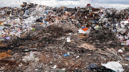Large landfill near the metropolis in autumn.