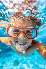 Naklejka premium Happy caucasian boy child joyfully dives underwater for an enjoyable and fun swimming experience
