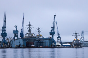 Battleship in port to be worked on