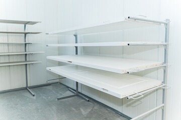 white doors on the shelves in workshop, carpentry concept. High quality photo
