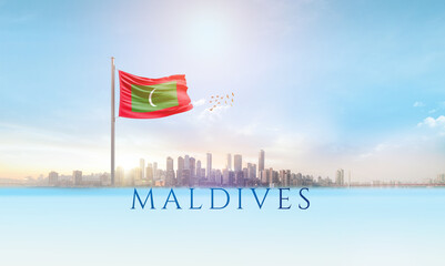 Maldives national flag waving in beautiful building skyline.