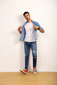 Cool Smart Guy Posing In Front Of Camera
