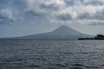 View of Pico Island from the ocean on the ferry from Faial Island. Azores, Portugal.