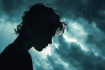 Silhouette of an individual with a storm cloud overhead, illustrating the weight of anxiety