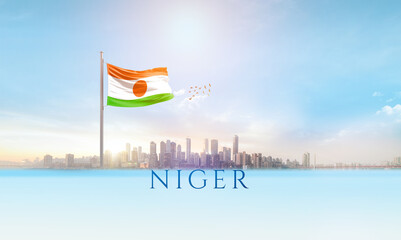 Niger national flag waving in beautiful building skyline.