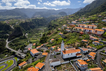 Fototapeta na wymiar Townscape of small village of Faial in Madeira Island, Portugal. Aerial drone view.
