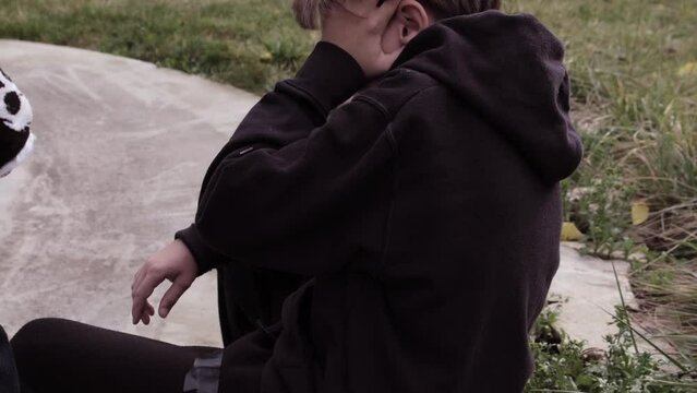 Teen bullying .Teenager attacked from behind and choking teen .Violence.Brutality Ambush Strangulation Aggression Harassment Menace Assault Hostility Cruelty Intimidation
