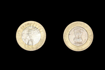 10 rupee Indian coin front view isolated on black background. Head and tail side of ten rupee coin. 