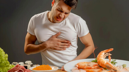 Portraying Food Allergy Response: Man Holding Chest, Seafood, Grey Background