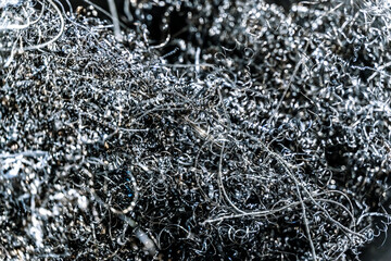 Metal shavings and waste in production. Waste metal in a factory
