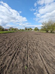 plowed field in spring © Оксана Ключник