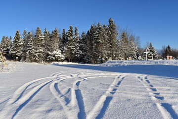 Tire tracks in the snow, Sainte-Apolline, Québec, Canada