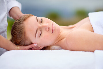 Woman, spa and relax with head massage with comfort for stress relief with beauty or health. Calm,...