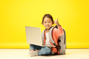 Enthusiastic Korean Child showing thumb up, Thrives in Online Learning. Adorable Japanese Kid Excels in Digital Classroom - 795253146