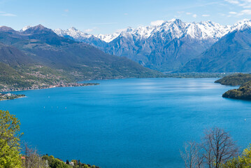 Fototapeta na wymiar Landscape of Lake Como in the sunny spring day, seen from Pianello di Lario, Lombardy, Italy.