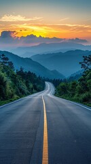 Asphalt highway road and mountain natural scenery at sunrise. Panoramic view.
