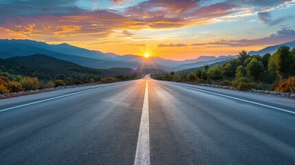 Asphalt highway road and mountain natural scenery at sunrise. Panoramic view.