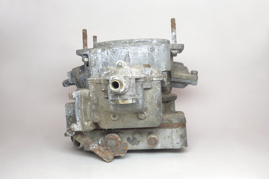 carburator of old car with petrol engine. showing brass fuel fiiting from float chamber side