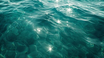 Blue-green surface of the ocean in Catalina Island, California, with gentle ripples on the surface and light refracting