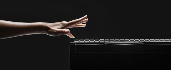 Hands on keyboard, hands of a person playing the piano, woman, music, black, studio background with...