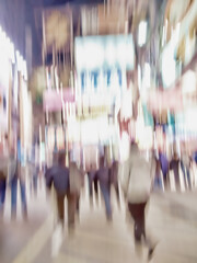 People, walking and town with motion blur at night of busy street with lights in New York City....