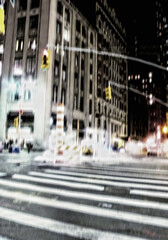 Blur, street and building in city at night with traffic lights for art, creative or illusion....