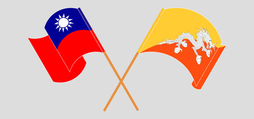 Crossed and waving flags of Taiwan and Bhutan