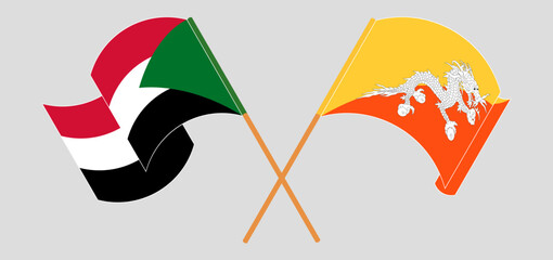 Crossed and waving flags of the Sudan and Bhutan