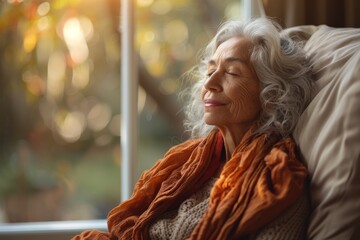 An elderly woman with gray hair rests peacefully by a sunlit window with warm hues - Powered by Adobe